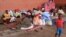 Des familles de migrants et de réfugiés dans un camp de fortune à Mamoudzou, Mayotte, le 16 juin 2016.
