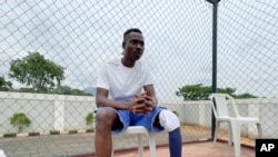 FILE—Peacemaker Azuegbulam, 27 Years old, Africa's first gold medalist at the Invictus Games , poses for a photograph after an exhibition sitting volleyball match in Abuja Nigeria, May 11, 2024.