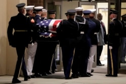 Pallbearers carry the casket of the late Rep. Elijah Cummings ahead of his funeral at New Psalmist Baptist Church, in Baltimore, Oct. 25, 2019.