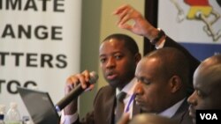 Shingirai Nangombe, Principal Metereologist in the Climate Change Section of the Metereological Department, stressing a point at a climate change conference in Harare.