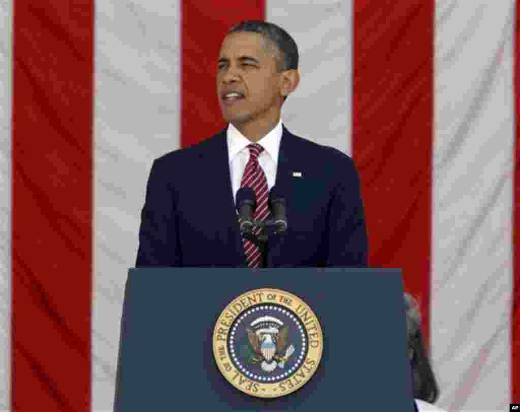 President Barack Obama speaks at the Memorial Day Observance at the Memorial Amphitheater at Arlington National Cemetery, Monday, May 28, 2012. (AP Photo/Charles Dharapak)