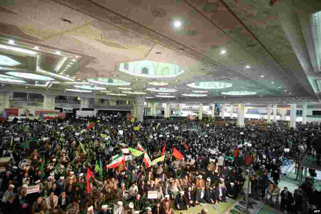 Iranians gather in support of the government at the Imam Khomeini grand mosque in the capital Tehran, Iran, Dec. 30, 2017.