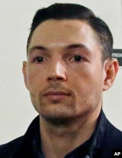 FILE - Bryon Hefner, estranged husband of former Massachusetts Senate President Stan Rosenberg, departs his arraignment on sexual assault and other charges at Suffolk Superior Court in Boston, April 24, 2018.