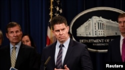 Acting FBI Deputy Director David Bowdich speaks at a news conference at the Department of Justice in Washington, Feb. 22, 2018.