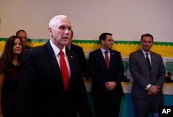 Vice President Mike Pence arrives to speak at Iglesia Doral Jesus Worship Center for a round-table discussion on the political crisis in Venezuela with community leaders in Doral, Fla., Feb. 1, 2019.