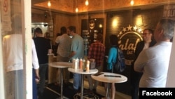 Customers line up at Falafel, Inc., a shop in Washington that donates a portion of its profits to the UN to help feed refugees. (Courtesy Falafel, Inc. Facebook page)