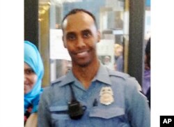 In this May 2016 image provided by the City of Minneapolis, police officer Mohamed Noor poses for a photo at a community event welcoming him to the Minneapolis police force.