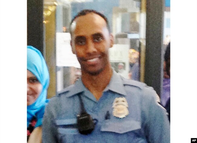 In this May 2016 image provided by the city of Minneapolis, Officer Mohamed Noor poses for a photo at a community event welcoming him to the Minneapolis police force.