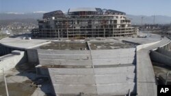 In this photo taken Thursday, Dec. 23, 2010 the construction of the Grand Ice Arena is seen in the Black Sea resort of Sochi, southern Russia. Sochi will host Winter Olympic games in 2014.