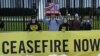 FILE — Demonstrators supporting Israel hold signs next to demonstrators calling for a cease-fire, in front of the White House in Washington, DC, Nov. 15, 2023. 