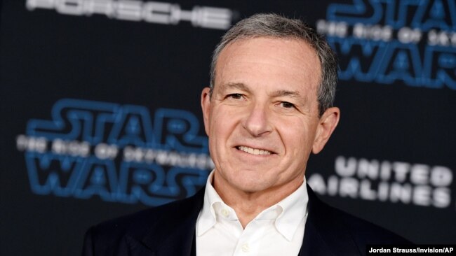 FILE - In this Dec. 16, 2019, file photo, Disney CEO Robert Iger arrives at the world premiere of