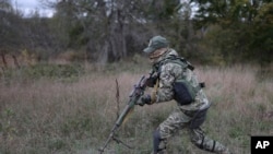 ရုရှားတောင်ပိုင်း Krasnodar ဒေသတွင်းမှာ စစ်သားစုဆောင်းရေးတပ်ဖွဲ့ဝင်တယောက် သေနတ်ပစ်လေ့ကျင့်နေစဥ်။ (အောက်တိုဘာ ၂၁၊ ၂၀၂၂)