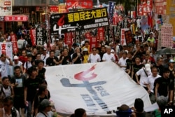 Hàng ngàn người ở Hong Kong diễu hành kỷ niệm 25 năm trận đàn áp đẫm máu cuộc biểu tình đòi dân chủ ở quảng trường Thiên An Môn, Bắc Kinh, 4/6/1989.