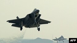 FILE - Israeli F35 I fighter jets take part in the "Blue Flag" multinational air defense exercise at the Ovda air force base, north of the Israeli city of Eilat, Nov. 11, 2019.