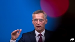 NATO Secretary General Jens Stoltenberg talks to journalists during a news conference at NATO headquarters in Brussels, Belgium, Oct. 24, 2018