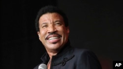 FILE - Lionel Richie performs on the Pyramid stage at Glastonbury music festival on Worthy Farm, Glastonbury, England.