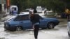 俄罗斯暴雨引发洪水 103人死亡