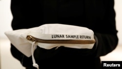 FILE - The Apollo 11 Contingency Lunar Sample Return Bag used by astronaut Neil Armstrong is displayed for Sotheby's.