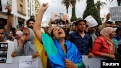 Demonstrators shout slogans during a sit-in against the sentence of Moroccan court after jailing Moroccan activist and the leader of Hirak, Nasser Zefzafi, and number of other activists, in Rabat, Morocco June 27, 2018. 