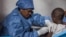 FILE - A child is inoculated with an Ebola vaccine in Goma, Democratic Republic of the Congo, November 22, 2019. 
