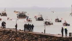 Fishing vessels gather at sea off the coast of Jersey, May 6, 2021. French fishermen angry over loss of access to waters off the coast have gathered their boats in protest off the English Channel island of Jersey.