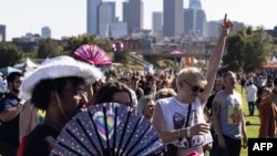People attend L.A. Pride in the Park at Los Angeles State Historic Park in Los Angeles on June 8, 2024.