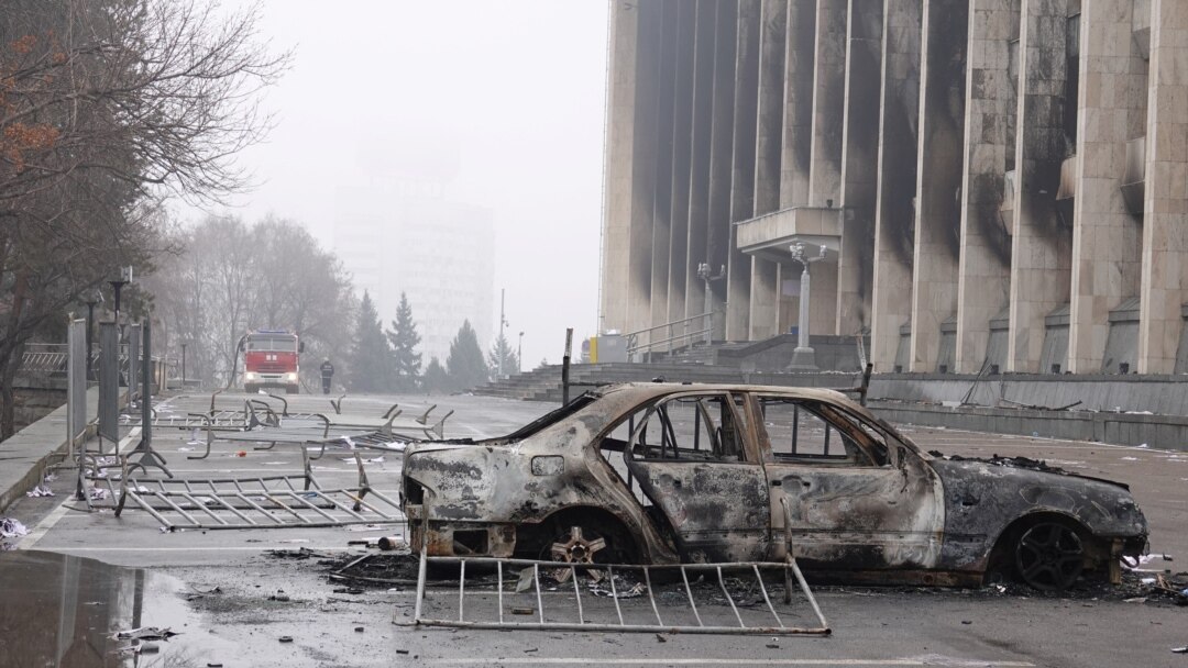 A view shows a burnt car following the protests triggered by fuel price increase outside the city administration headquarters in Almaty, Kazakhstan, Jan. 7, 2022.
