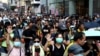 香港實施”禁蒙面法”首日 網民發起全民蒙面遊行抗爭