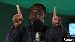 Ahmad Isah, the host of Nigeria's "Brekete Family" radio program, speaks to his audience at Human Rights Radio in Abuja, Nigeria, June 26, 2018.