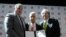 FILE - In this April 10, 2017, photo, Victor Montagliani, left, President of the Canadian Soccer Association, Sunil Gulati, center, President of the United States Soccer Federation, and Decio de Maria, President of the Mexican Football Federation, show their unified bid to co-host the 2026 World Cup, in New York. 
