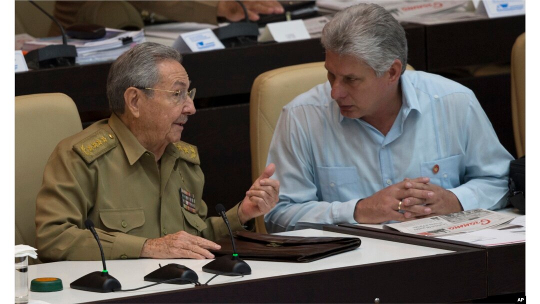 Cuba's President Raul Castro, left, talks with Vice President Miguel Diaz Canel during the opening of the National Assembly session in Havana, Cuba, July 8, 2016.
