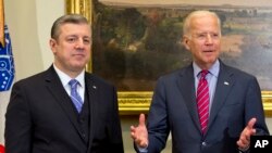 Vice President Joe Biden, accompanied by Georgian Prime Minister Giorgi Kvirikashvili speaks in the Roosevelt Room of the White House in Washington, April 26, 2016.
