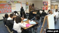 Students attend a financial literacy class at Charles H. Flowers High School in the state of Maryland.