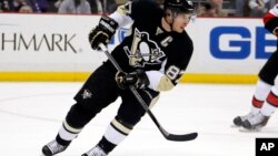 FILE - Players and fans alike know the Pittsburgh Penguins' Sidney Crosby is a tough player to stop — but the mumps did it. 