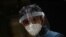 A man wearing a protective mask and visor is seen in London, as the spread of the coronavirus disease (COVID-19) continues, April 13, 2020. 