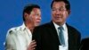 Philippine President Rodrigo Duterte, left, and Cambodian Prime Minister Hun Sen, right, attend an opening the World Economic Forum on ASEAN, in Phnom Penh, Cambodia, Thursday, May 11, 2017. Some 700 people from 40 countries in the region has been attended this week the World Economic Forum on ASEAN that was held by impoverished Cambodia. (AP Photo/Heng Sinith)