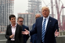 President Donald Trump speaks as he views construction during a visit to Shell's soon-to-be completed Pennsylvania Petrochemicals Complex, Aug. 13, 2019, in Monaca, Pennsylvania.