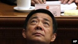 Bo Xilai, en la ceremonia del cierre de sesión del congreso chino.