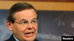 FILE - Senator Robert Menendez (D-NJ) speaks at a news conference.