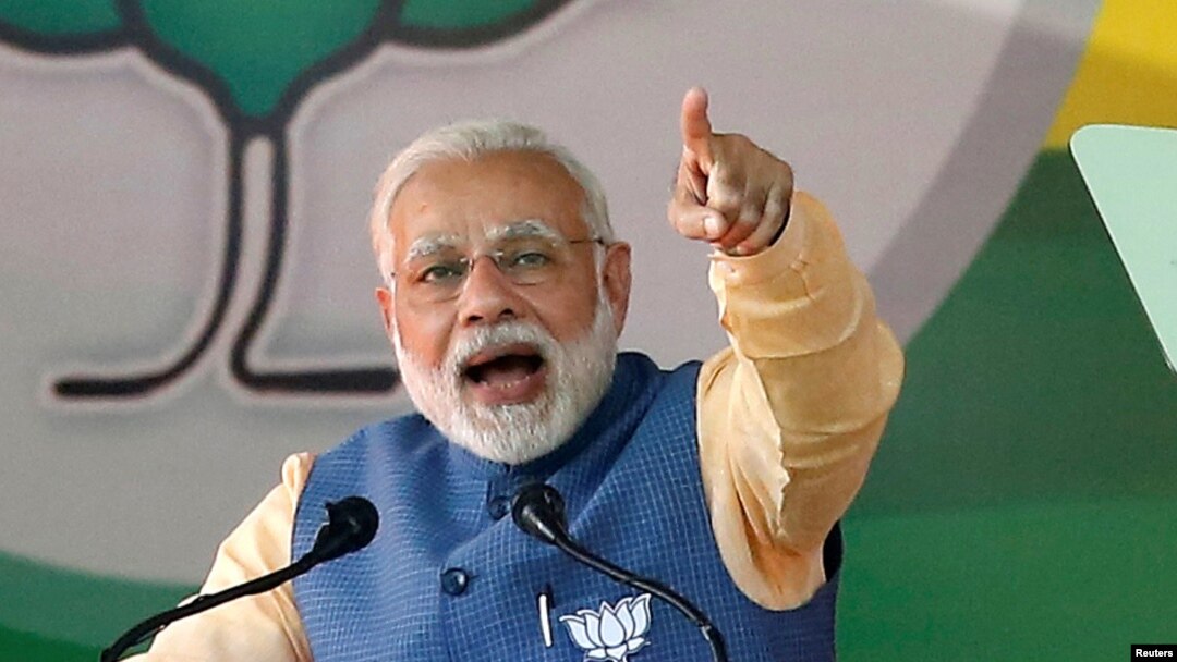 FILE - India's Prime Minister Narendra Modi addresses an election campaign rally ahead of the Karnataka state assembly elections in Bengaluru, India, Feb. 4, 2018.