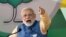 FILE - India's Prime Minister Narendra Modi addresses an election campaign rally ahead of the Karnataka state assembly elections in Bengaluru, India, Feb. 4, 2018.