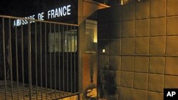 Bullet holes and burn marks are visible on the gate of the French Embassy following an attack in the evening in Bamako, Mali, 05 Jan 2011