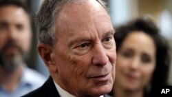 FILE - Potential Democratic presidential candidate Michael Bloomberg speaks to workers during a tour of the WH Bagshaw Company, a pin and precision component manufacturer, in Nashua, N.H., Jan. 29, 2019.