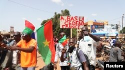Supporters of Burkina Faso's new junta protest against the arrival of ECOWAS delegation in Ouagadougou