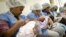 FILE - Mothers breastfeed their newborn babies in the natal intermediate care unit at the Santa Ana public maternity hospital in Caracas, Oct. 22, 2011. 