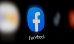 A Facebook logo is displayed on a smartphone in this illustration taken Jan. 6, 2020.