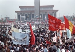 FILE - Hundreds of thousands of people, seeking political and economic reforms, crowded Beijing’s central Tiananmen Square on May 17, 1989, in the biggest popular upheaval in China since the Cultural Revolution of the 1960s.
