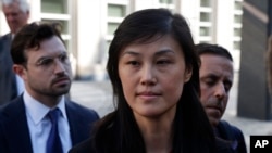 Linda Sun, a former aide to New York Governor Kathy Hochul, leaves Brooklyn Federal Court after her arraignment, Sept. 3, 2024, in New York.