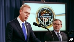 Deputy Defense Secretary Patrick Shanahan, left, speaks next to Deputy Energy Secretary Dan Brouillette, during a news conference on the 2018 Nuclear Posture Review at the Pentagon, Feb. 2, 2018. 