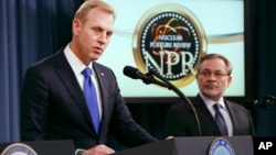 Deputy Defense Secretary Patrick Shanahan, left, speaks next to Deputy Energy Secretary Dan Brouillette, during a news conference on the 2018 Nuclear Posture Review at the Pentagon, Feb. 2, 2018. 